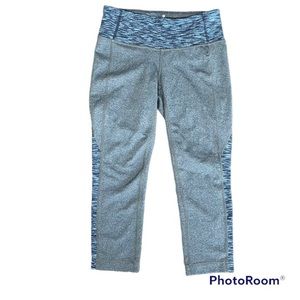 Athleta Gray Capri tights with Multi blue stripe pattern accents. size XS EUC